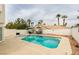 Inviting backyard oasis featuring a sparkling pool and patio area at 8424 Oyster Dr, Las Vegas, NV 89128