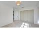 Bedroom with double doors leading to an adjacent room and built-in closet at 8466 Lambert Dr, Las Vegas, NV 89147