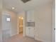 Hallway with built-in storage and bathroom access at 8466 Lambert Dr, Las Vegas, NV 89147