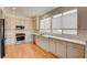 Modern kitchen with white cabinets and stainless steel appliances at 8466 Lambert Dr, Las Vegas, NV 89147