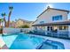 Stunning pool and spa area with a spacious backyard and patio at 8466 Lambert Dr, Las Vegas, NV 89147