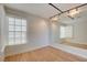 Studio with wood floors and a large mirror at 8466 Lambert Dr, Las Vegas, NV 89147