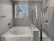 Bathroom with soaking tub and separate shower at 866 Austin Peak Ct, Las Vegas, NV 89110