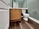 Powder room with wood vanity and single sink at 866 Austin Peak Ct, Las Vegas, NV 89110