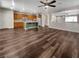 Kitchen with wood cabinets, an island, and hardwood floors at 866 Austin Peak Ct, Las Vegas, NV 89110