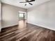 Bright living room with hardwood floors and ceiling fan at 866 Austin Peak Ct, Las Vegas, NV 89110