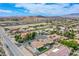 Aerial view of a house with a large backyard and solar panels at 8965 S Tenaya Way, Las Vegas, NV 89113