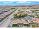 Aerial view of house, extensive landscaping, and neighborhood at 8965 S Tenaya Way, Las Vegas, NV 89113