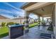 Covered patio with concrete flooring and ramp access at 8965 S Tenaya Way, Las Vegas, NV 89113