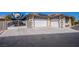 House exterior with double garage and RV gate at 8965 S Tenaya Way, Las Vegas, NV 89113