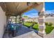 Covered patio with string lights and comfortable seating at 8965 S Tenaya Way, Las Vegas, NV 89113