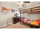 bedroom with bunk beds, dresser, and Chiefs decor at 9124 Ironstone Ave, Las Vegas, NV 89143