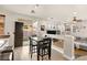 Casual dining area with table and chairs, adjacent to kitchen and Gathering room at 9124 Ironstone Ave, Las Vegas, NV 89143