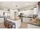 Spacious kitchen featuring granite countertops, stainless steel appliances, and an island at 9124 Ironstone Ave, Las Vegas, NV 89143