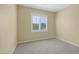 Simple bedroom with neutral walls and carpet at 9221 Black Lake Pl, Las Vegas, NV 89178