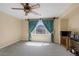 Bedroom with mountain view and ceiling fan at 9221 Black Lake Pl, Las Vegas, NV 89178