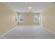 Bright bedroom featuring neutral walls and carpet at 9221 Black Lake Pl, Las Vegas, NV 89178