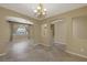 Formal dining room with tile floors and window at 9221 Black Lake Pl, Las Vegas, NV 89178