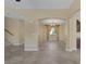 Dining room with tile floors and a chandelier at 9221 Black Lake Pl, Las Vegas, NV 89178