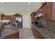 Well-equipped kitchen with stainless steel appliances and granite countertops at 9221 Black Lake Pl, Las Vegas, NV 89178