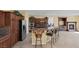 Modern kitchen featuring dark wood cabinets, granite countertops, and stainless steel appliances at 9221 Black Lake Pl, Las Vegas, NV 89178