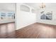 Dining room with hardwood floors and archways at 9307 Bondeno St, Las Vegas, NV 89123