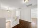 Upstairs hallway with dark laminate floors at 9307 Bondeno St, Las Vegas, NV 89123