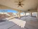 Spacious covered patio with ceiling fans, perfect for outdoor entertaining at 9307 Bondeno St, Las Vegas, NV 89123