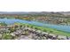 Aerial view of lakefront homes and golf course community at 103 San Martino Pl, Henderson, NV 89011