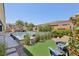Relaxing backyard with artificial turf and seating area at 103 San Martino Pl, Henderson, NV 89011