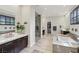 Spa-like bathroom with soaking tub, walk-in shower, and dual vanities at 103 San Martino Pl, Henderson, NV 89011