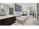 Luxurious bathroom with double vanity, soaking tub, and walk-in shower at 103 San Martino Pl, Henderson, NV 89011