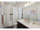 Clean bathroom with a bathtub, shower, and modern vanity at 103 San Martino Pl, Henderson, NV 89011