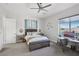 Bright bedroom featuring a comfortable bed and a workspace at 103 San Martino Pl, Henderson, NV 89011