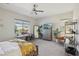 Bedroom with a desk, seating area, and large window at 103 San Martino Pl, Henderson, NV 89011