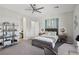 Spacious bedroom with a comfortable bed and built-in shelving at 103 San Martino Pl, Henderson, NV 89011