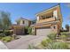 Stunning two-story home with a three-car garage and stone accents at 103 San Martino Pl, Henderson, NV 89011