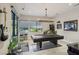 Game room with pool table, arcade game, and access to backyard patio at 103 San Martino Pl, Henderson, NV 89011