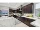 Modern kitchen with expansive countertops and stainless steel appliances at 103 San Martino Pl, Henderson, NV 89011