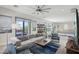 Relaxing living room with ample seating and a modern aesthetic at 103 San Martino Pl, Henderson, NV 89011