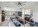 Spacious living room with comfortable seating and large windows at 103 San Martino Pl, Henderson, NV 89011