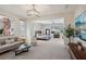 Luxurious main bedroom suite with sitting area and ample natural light at 103 San Martino Pl, Henderson, NV 89011