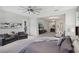 Spacious main bedroom with sitting area and access to private ensuite bathroom at 103 San Martino Pl, Henderson, NV 89011