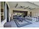 Covered patio with seating area and ceiling fans at 103 San Martino Pl, Henderson, NV 89011
