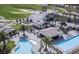 Resort-style pool with lounge chairs and palm trees at 103 San Martino Pl, Henderson, NV 89011
