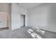 Cozy bedroom with plush carpeting and a closet provides ample storage space at 10300 Bent Brook Pl, Las Vegas, NV 89134