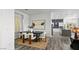 Open concept floor plan with dining room overlooking the kitchen at 10300 Bent Brook Pl, Las Vegas, NV 89134