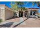 Inviting home entrance featuring stone accents and manicured landscaping at 10300 Bent Brook Pl, Las Vegas, NV 89134