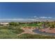Scenic view of the golf course with lush greenery and beautiful blue skies at 10300 Bent Brook Pl, Las Vegas, NV 89134