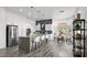 Modern kitchen featuring a large center island with counter seating at 10300 Bent Brook Pl, Las Vegas, NV 89134